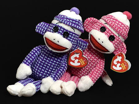 pink and purple-quilted Sock Monkey Beanie Babies