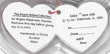 Inky (gray with mouth) inside of swing tag